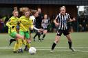 Anna Larkins and Katie Knights win the ball back at the heart of the Canaries defence