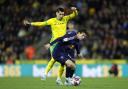 Leeds United's Brenden Aaronson and Norwich City's Borja Sainz battle for the ball