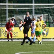 Tash Snelling places her shot beyond the reach of the Cambridge 'keeper to give City the lead