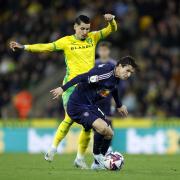 Leeds United's Brenden Aaronson and Norwich City's Borja Sainz battle for the ball