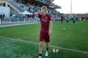 Todd Cantwell goes to thank the Norwich City fans after the pre-season friendly win against Marseille