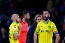 Teemu Pukki and Grant Hanley look dejected after the defeat at Burnley - they must lift themselves and the fans when Stoke head to Carrow Road