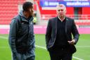 Dean Smith talks to Isaac Hayden before their Championship clash against Rotherham