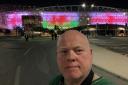 Focus Images photographer Paul Chesterton outside the stadium before England's World Cup win over Wales.