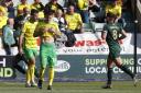 Norwich players look dejected after Plymouth get a fourth goal