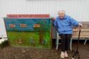 Joy Hunt, 97, next to her winning bin design at Caister playing field.