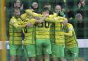 Josh Sargent is mobbed after sealing Norwich City's 1-0 Championship win over Sunderland