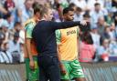 Johannes Hoff Thorup gives instructions to Oscar Schwartau and Anis Ben Slimane, right, at Coventry