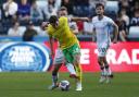 Kenny McLean feels Norwich City have the squad to compete for a Premier League return