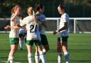 Shannon Shaw celebrates with her team-mates after making it 2-1