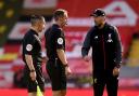 David Coote and Jurgen Klopp clash