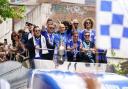 Leicester celebrate last season’s Championship triumph with Jamie Vardy, second left, next to then boss Enzo Maresca, centre (Joe Giddens/PA)