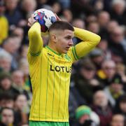 Norwich City have a decision to make over the future of winger Christos Tzolis.