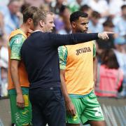 Johannes Hoff Thorup gives instructions to Oscar Schwartau and Anis Ben Slimane, right, at Coventry