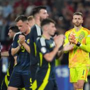 Angus Gunn (right) took responsibility for Portugal's first goal against Scotland