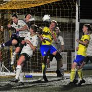 City keeper Sarah Quantrill punches clear in a crowded goalmouth