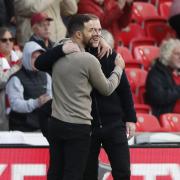 An embrace at the final whistle between former Norwich first team coach Narcis Pelach and Canaries' chief Johannes Hoff Thorup