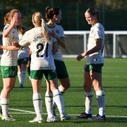 Shannon Shaw celebrates with her team-mates after making it 2-1