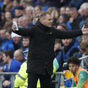 Norwich City crashed to a late defeat at Cardiff City