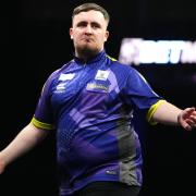 Luke Littler was in imperious form as he destroyed Rob Cross at the Players Championship Finals (Zac Goodwin/PA)