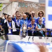 Leicester celebrate last season’s Championship triumph with Jamie Vardy, second left, next to then boss Enzo Maresca, centre (Joe Giddens/PA)