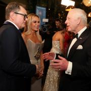 The King meets Alan Carr after the Royal Variety Performance at the Royal Albert Hall, London. (Hollie Adams/PA)