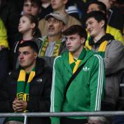 Norwich City fans watch on from the stands