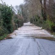 Flood alerts are in place across some parts of the UK as the country continues to be battered by Storm Bert (PA)