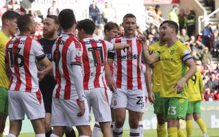 Kenny McLean and Ben Wilmot share a difference of opinion in Norwich City's 1-1 Championship draw at Stoke City